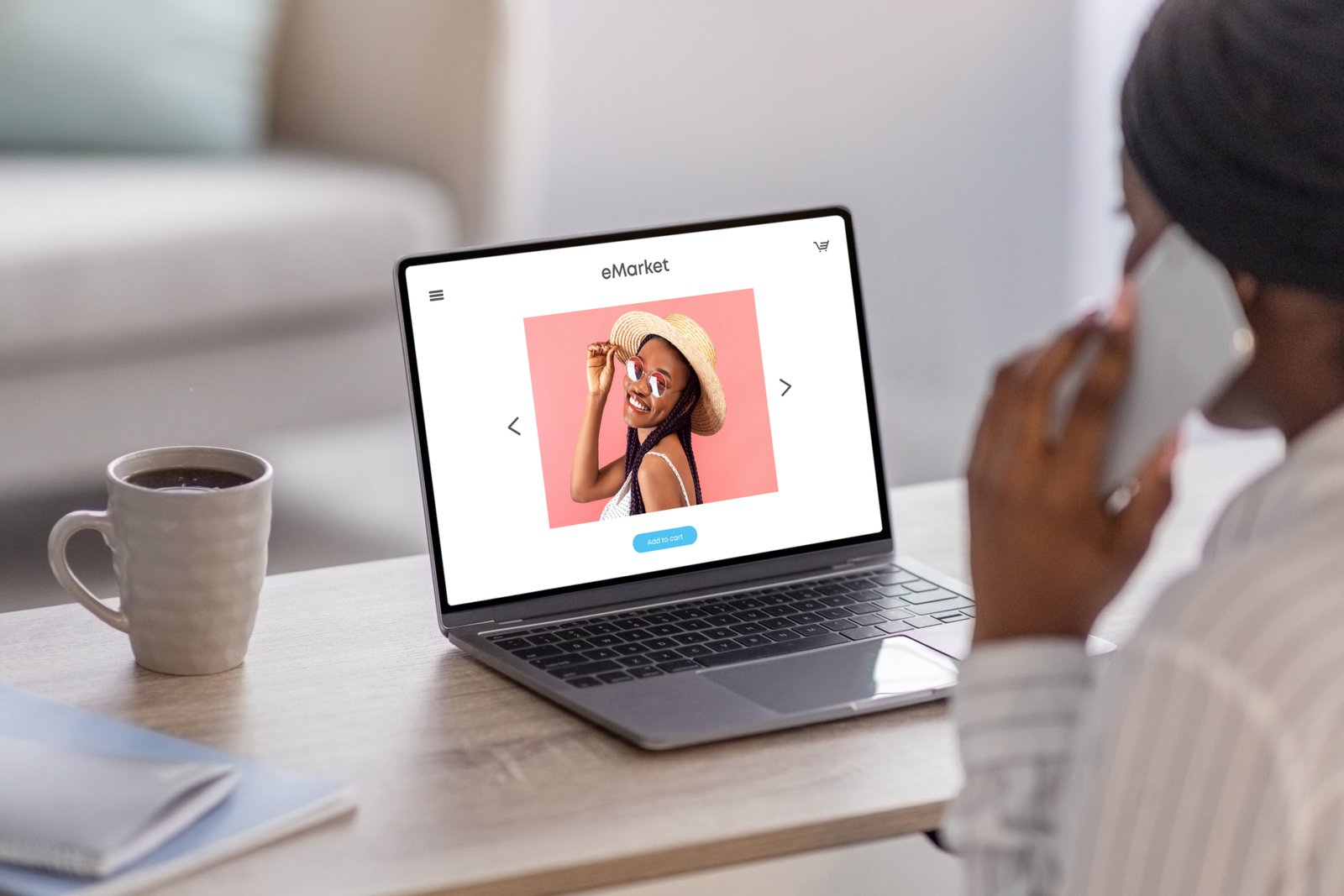 Millennial black woman have conversation on mobile phone, call, use laptop with fashion store on screen, copy space. African american customer shopaholic enjoy online shopping